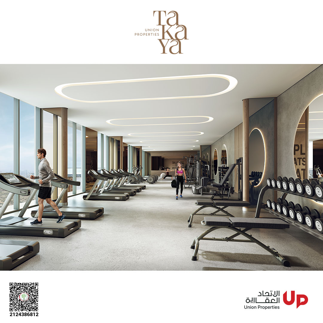 Fully equipped gym with panoramic windows at TAKAYA